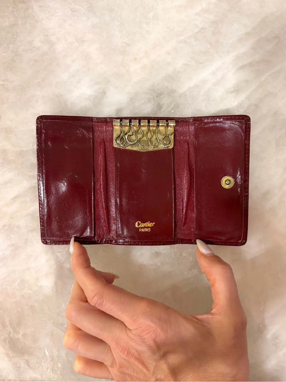 Vintage Cartier Burgundy Leather Key Holder with Embossed Logo